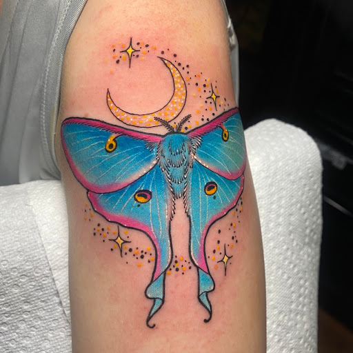 Explore lower leg tattoo ideas, creative tattoo ideas in Saint Albans, available at 100 Candles Tattoo