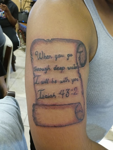 Explore bird family tattoo ideas, creative tattoo ideas in Stafford, available at Tattooz By King