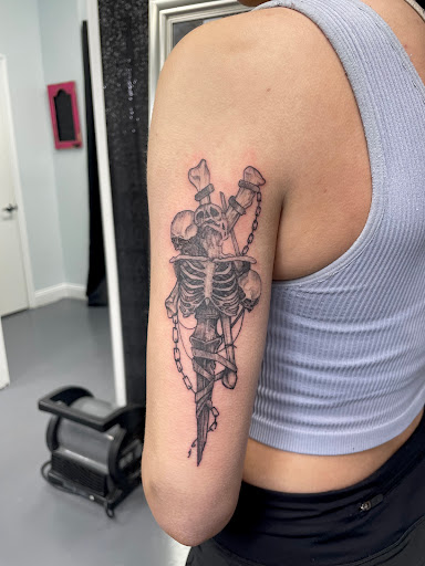 Explore dog paw print tattoo ideas, creative tattoo ideas in Meridian, available at Creative Pain Tattoo Studio