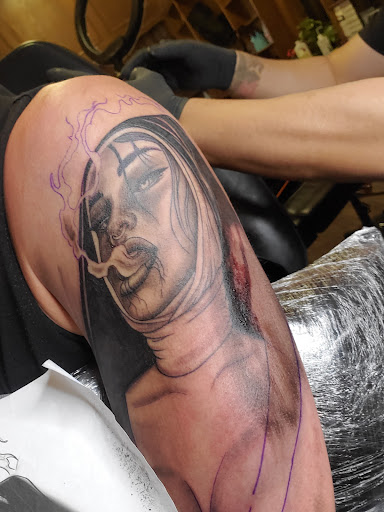 Tattoo artist Denton