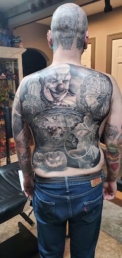 Find rib tattoo ideas for females for your next unique tattoo in Springfield at Dark Ship Tattoo inc