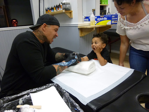 Tattoo Shop «magnum opus tattoo company», reviews and photos, 1817 Padre Blvd #4, South Padre Island, TX 78597, USA