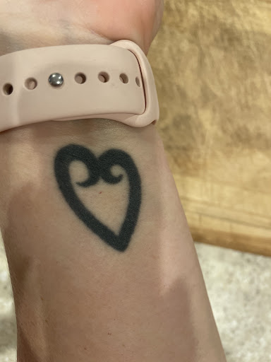 Explore tattoo ideas for family symbol, creative tattoo ideas in Conroe, available at Nicoles Tattoos and Piercings