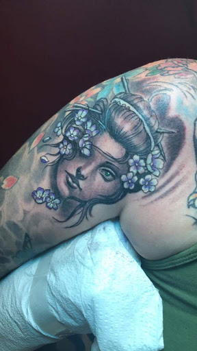 Find tattoo ideas snake for your next unique tattoo in Blue Island at Ricasso Art Works