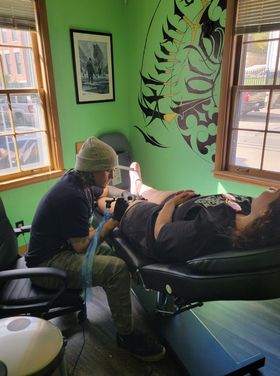Explore tattoo ideas on inner arm, creative tattoo ideas in Galena, available at Emerald Buddha Tattoo