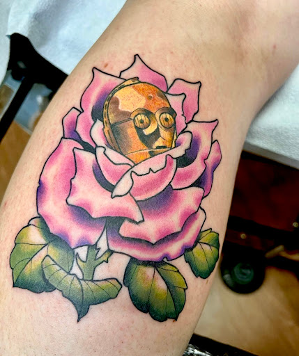 Find under the breast tattoo ideas for your next unique tattoo in Portsmouth at Grim North Tattoo and Piercing