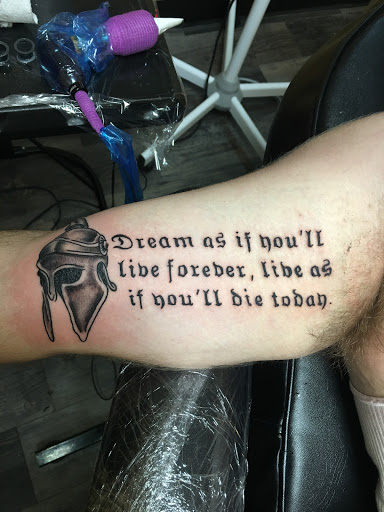 Explore black heart tattoo ideas, creative tattoo ideas in Warner Robins, available at Untold Pain Tattoo Studio