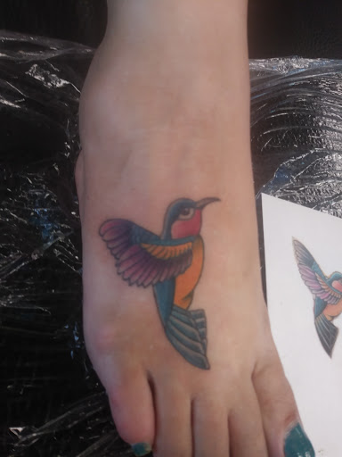 Explore venom tattoo ideas, creative tattoo ideas in Houston, available at Orlandos Tattoo Studio