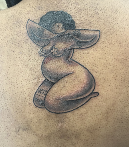 Explore male shoulder tattoo ideas, creative tattoo ideas in Davenport, available at Fine Ink Studios Tattoos