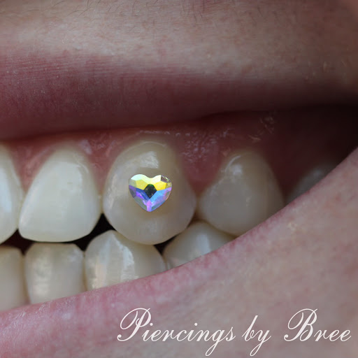 Explore barber pole tattoo ideas, creative tattoo ideas in New Orleans, available at Downtown Tattoos and Piercing