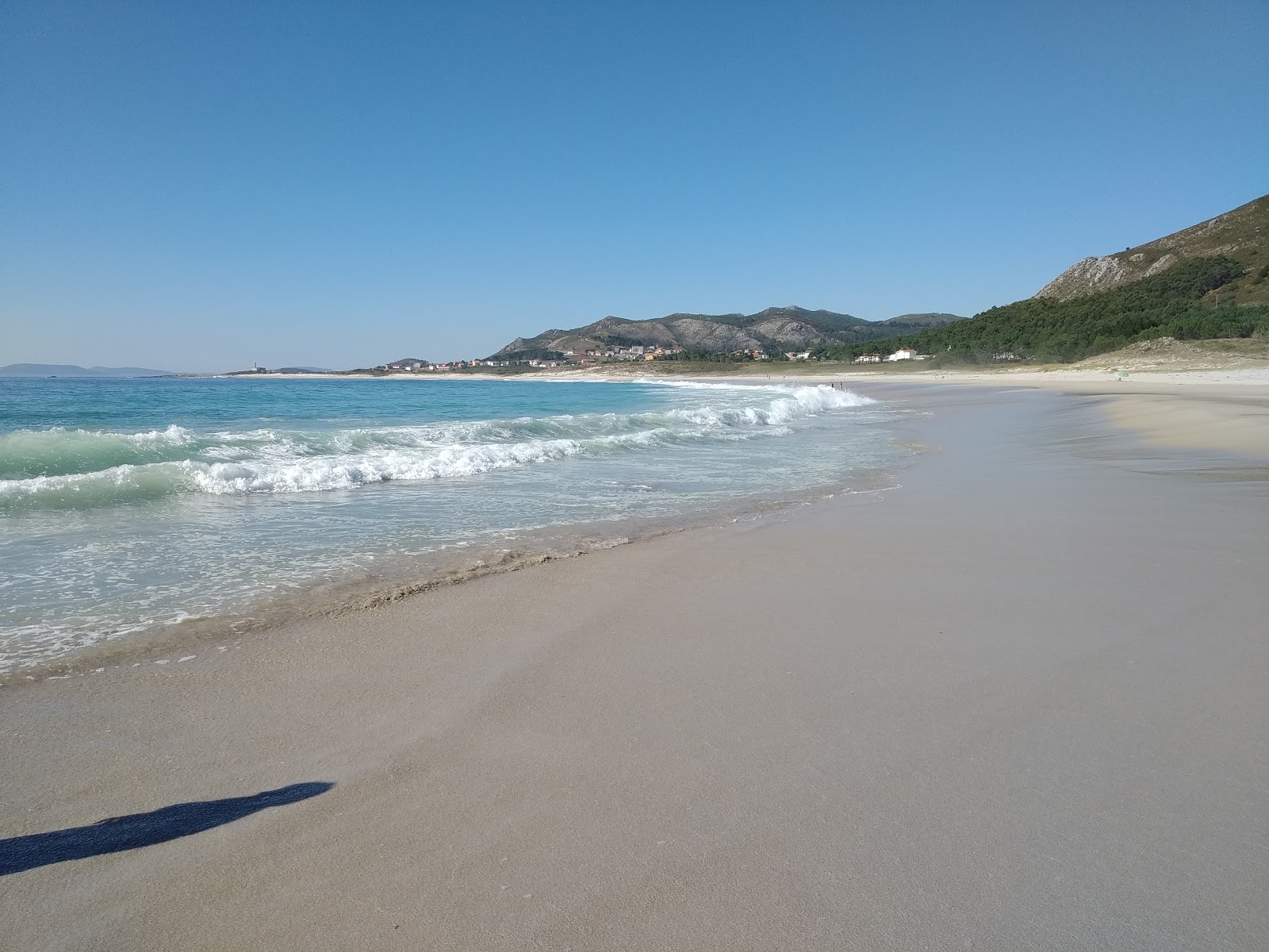 Fotografija Praia de Larino z dolg zaliv