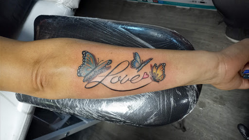 Find web tattoo ideas for your next unique tattoo in Arlington at Tat2z4Life LLC Tattoos and Body Piercings BY ALMA