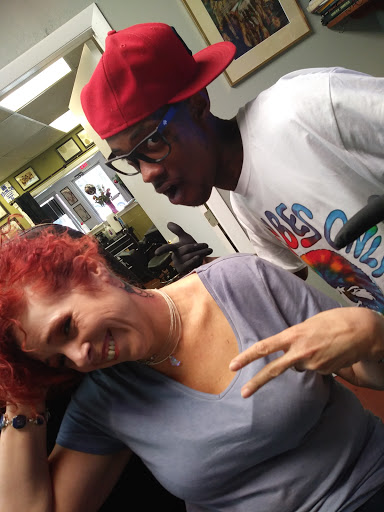 Explore small daisy tattoo ideas, creative tattoo ideas in Pinellas Park, available at Lollis Studios Tattoo Company