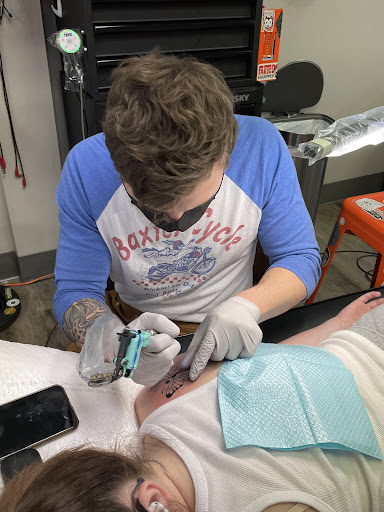 Explore joker tattoo ideas for guys, creative tattoo ideas in Omaha, available at Ironwood Ink