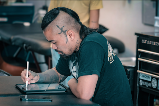 Explore feminine dragon tattoo ideas, creative tattoo ideas in Manchester, available at Sacred Heart Tattoos