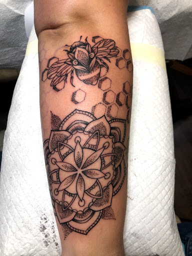 Explore ezra tattoo ideas, creative tattoo ideas in Mount Juliet, available at Division Street Tattoo Company