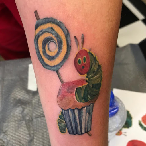 Explore bikini tattoo ideas, creative tattoo ideas in Augusta, available at Mr. Tattoo