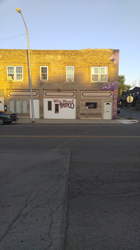 Explore greek tattoo ideas for men, creative tattoo ideas in Lima, available at White Wizard Tattoo & Body Piercing