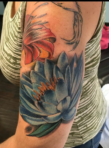 Explore mothman tattoo ideas, creative tattoo ideas in Orange Park, available at All Aces Tattoo and Body Piercing LLC