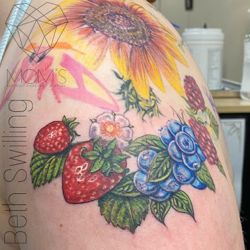 Explore anime leg tattoo ideas, creative tattoo ideas in Spokane, available at Moms Custom Tattoo & Body Piercing