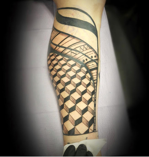 Explore 2 initial tattoo ideas, creative tattoo ideas in Sauk City, available at The Madison Tattoo Company