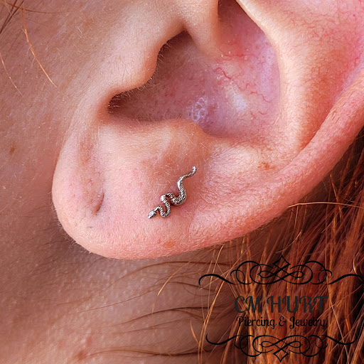 Explore wrestling tattoos ideas, creative tattoo ideas in Garden Grove, available at CM Hurt Piercing & Jewelry