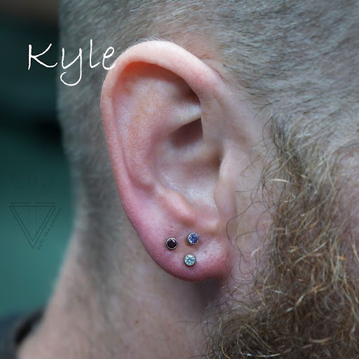 Explore sad tattoo ideas for guys, creative tattoo ideas in Sanford, available at Venom Ink Tattoo