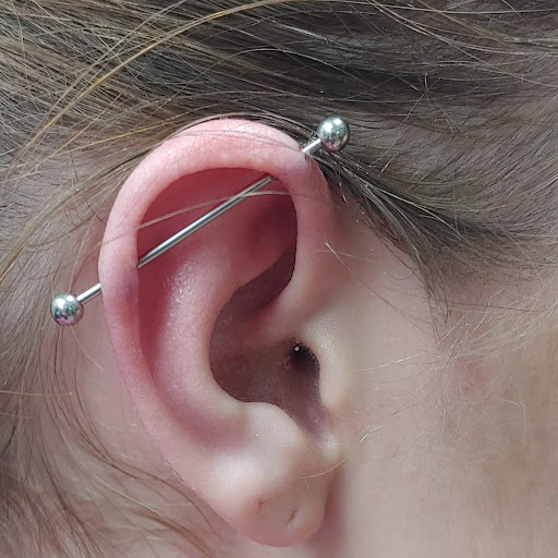 Explore anime neck tattoo ideas, creative tattoo ideas in San Marcos, available at Ollie the Impaler Body Piercing