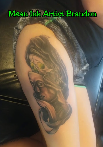 Explore tooled leather tattoo ideas, creative tattoo ideas in Wayne, available at Mean Ink Tattoo