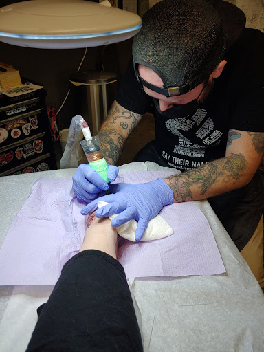 Explore beach tattoo ideas for guys, creative tattoo ideas in Georgetown, available at White Dog Tattoo