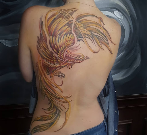 Explore hawk tattoo ideas, creative tattoo ideas in Rehoboth Beach, available at Tattoo Galaxy (Rehoboth Beach) Piercing & Custom tattoos