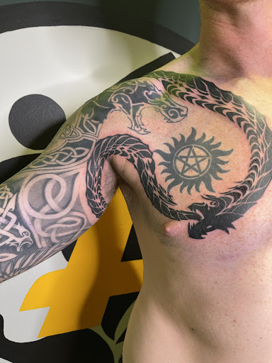 Explore men back tattoos ideas, creative tattoo ideas in San Diego, available at Inkfinite Artistry