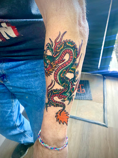 Explore mens script tattoo ideas, creative tattoo ideas in Kingsport, available at Inkd Outlaws Tattoos