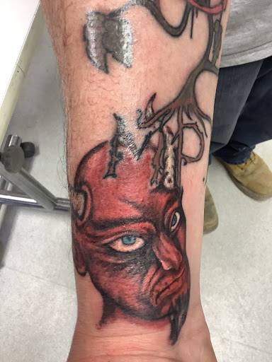 Explore adopted tattoo ideas, creative tattoo ideas in Turner, available at Heathen Ink