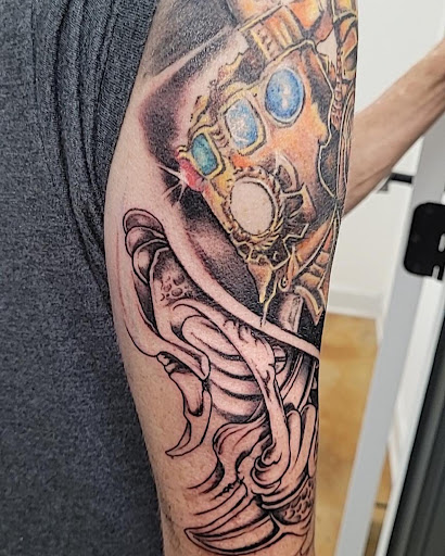Explore tattoo ideas for son on mom, creative tattoo ideas in Hernando, available at Watts Studio Tattoos