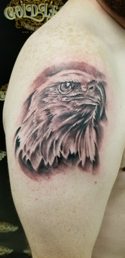 Explore unique knee tattoo ideas, creative tattoo ideas in Baraboo, available at Gold Leaf Tattoo Collective and Art Gallery