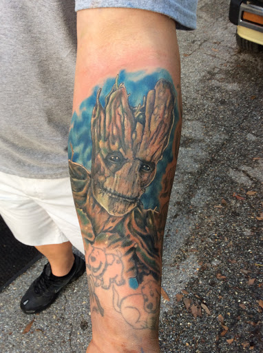 Explore leg flower tattoo ideas, creative tattoo ideas in Jacksonville, available at Electric Legacy Tattoo