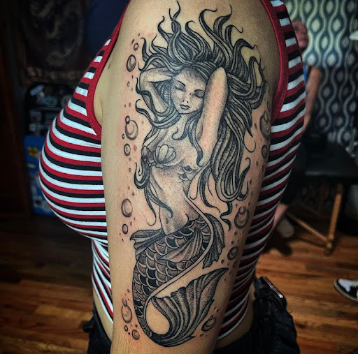 Explore twin miscarriage tattoo ideas, creative tattoo ideas in Lake Villa, available at Eternal Tiger Tattoo