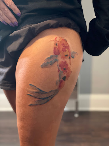 Explore tattoo name cover up ideas, creative tattoo ideas in Tampa, available at Shades of Blak Studios LLC