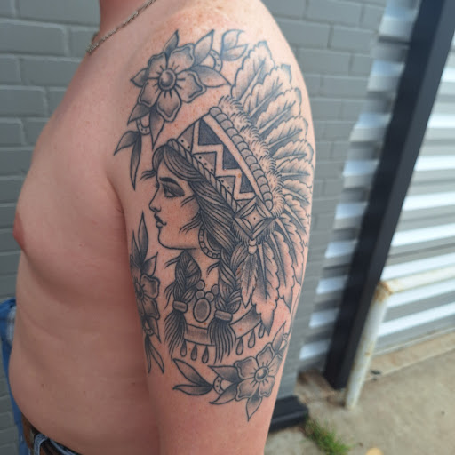 Explore book tattoo ideas, creative tattoo ideas in Oklahoma City, available at Black Magic Tattoo