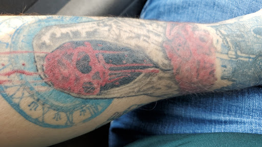 Explore black hole tattoo ideas, creative tattoo ideas in Albuquerque, available at Sachs Body Modification