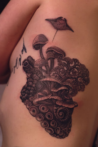 Explore flower tattoo sleeve ideas, creative tattoo ideas in Hudson, available at The Bohemian Social Club