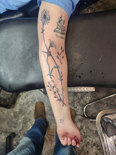 Explore skull tattoo sleeve ideas, creative tattoo ideas in Yankton, available at Exquisite Ink