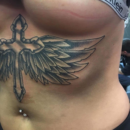 Explore minimalist cat tattoo ideas, creative tattoo ideas in Bridgeport, available at Breaking skin tattoo and body piercing