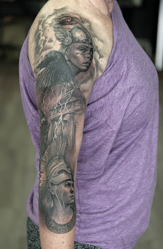 Explore magnolia tattoo ideas, creative tattoo ideas in Independence, available at Bare Skin Tattoo