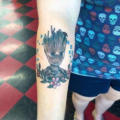 Explore husker tattoo ideas, creative tattoo ideas in Dayton, available at 33 Lions Tattoo