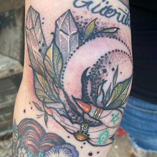 Explore rose tattoo ideas for women, creative tattoo ideas in Oklahoma City, available at Oklahoma Tattoo Collective