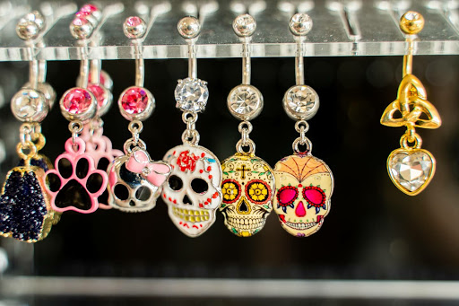 Explore spider web tattoo ideas, creative tattoo ideas in North Charleston, available at Exotic Impressions Body Piercing