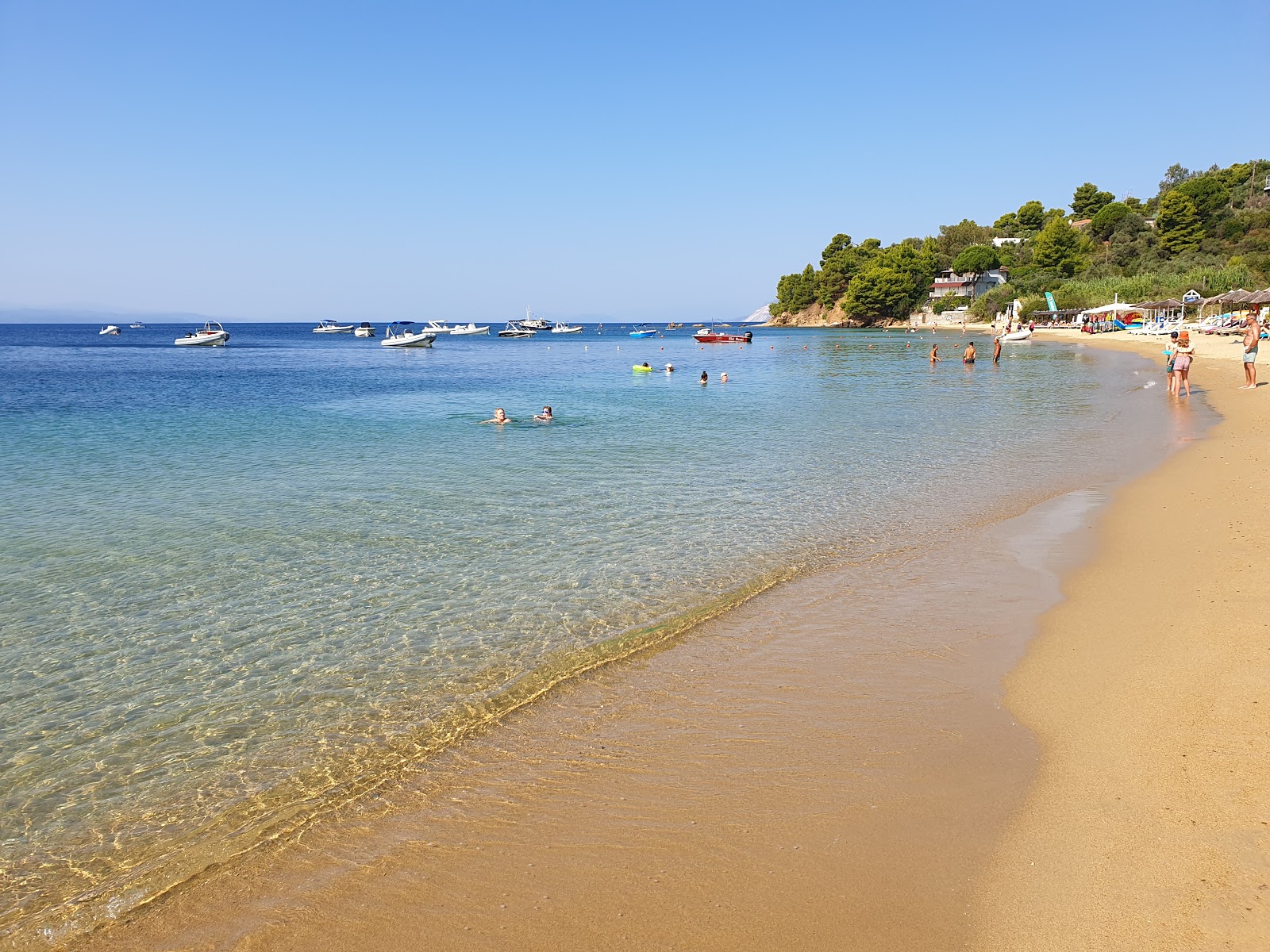 Photo of Troulos beach with bright fine sand surface