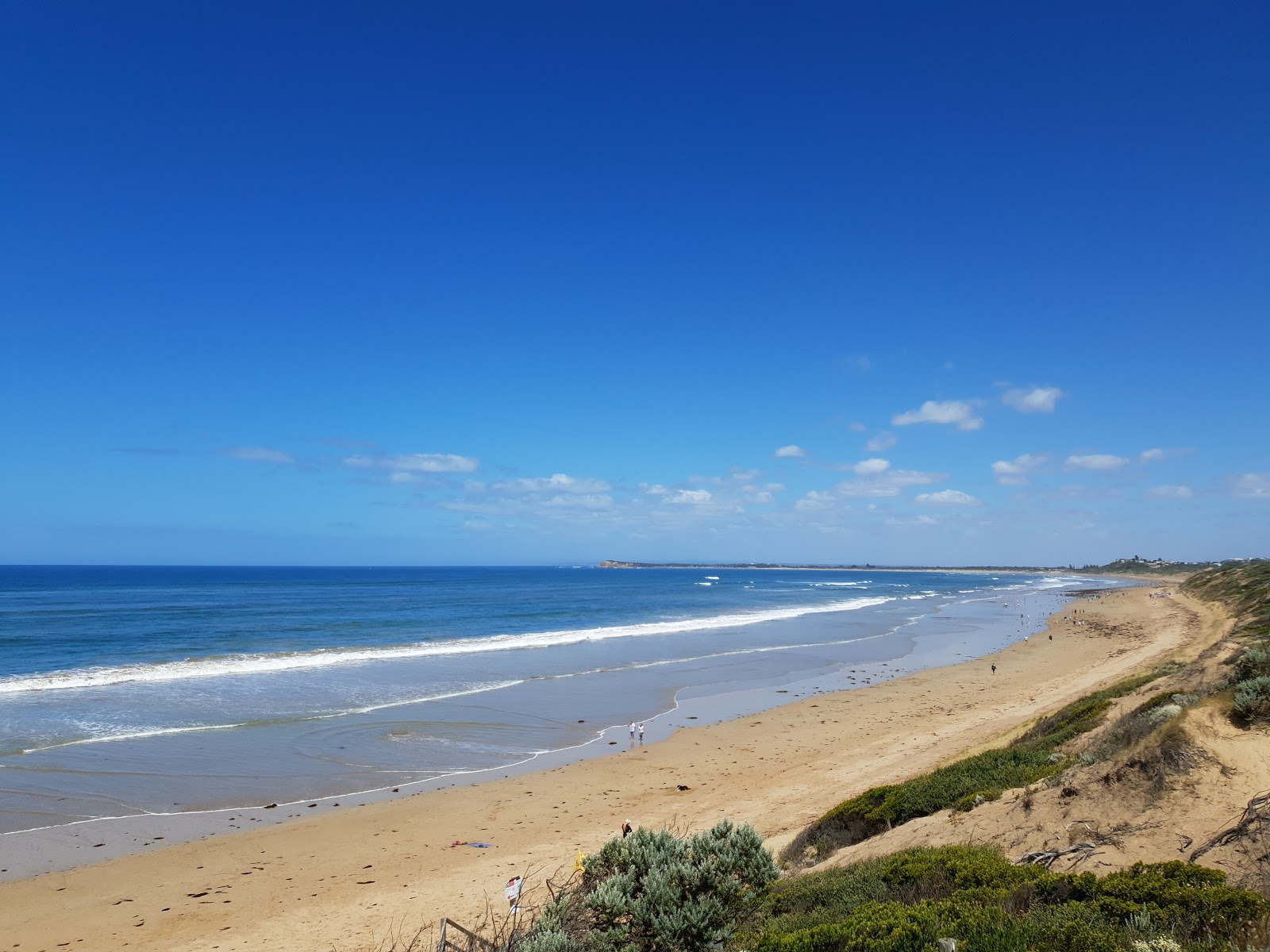 Foto van Ocean Grove Beach met helder zand oppervlakte